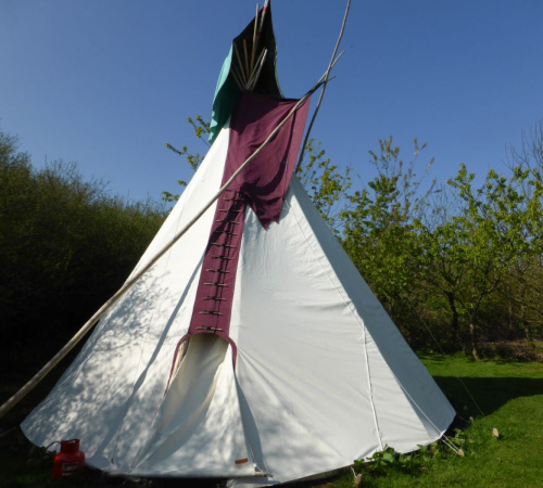 With Tipi Hat: Anglesey Tipi Holidays